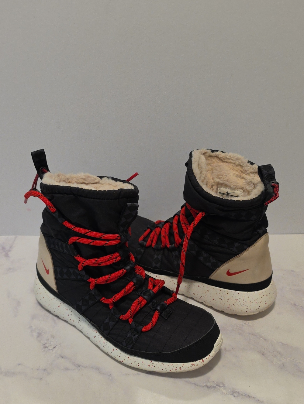 Nike Women’s Black and Red Insulated Winter Boots